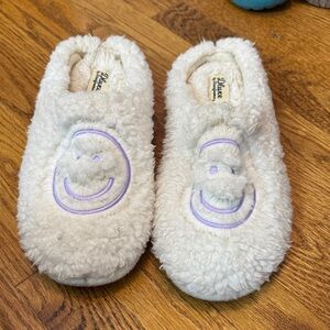 Plush White Slippers with Purple Accents
